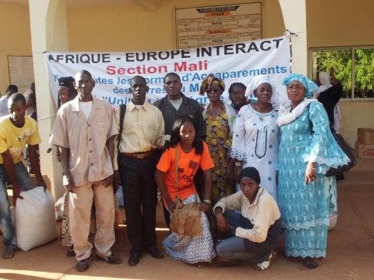 Activists of the malian section of Afrique-Europe-Interact during the handover of the food donation in Segou